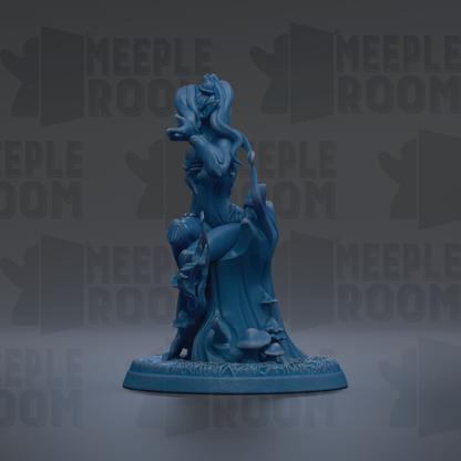 A blue figurine of a woman with long hair and a flowing dress, sitting on a rock and holding a flower, against a dark background with repeated text.