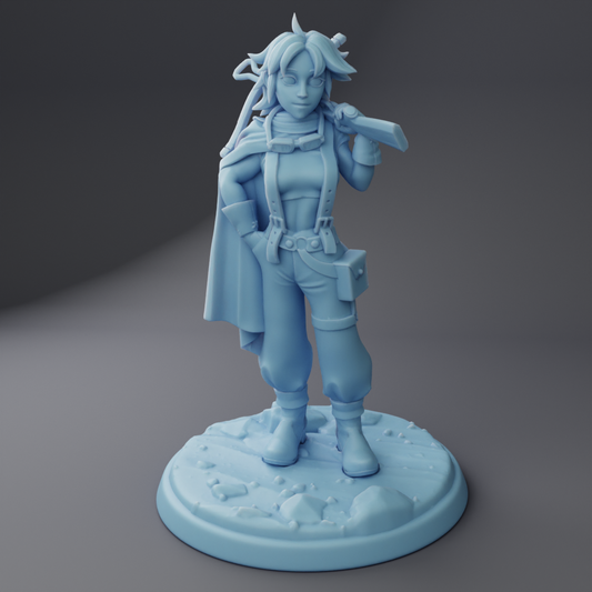 A 3D model of a female character with long hair, wearing a cape and holding a weapon, standing on a base.