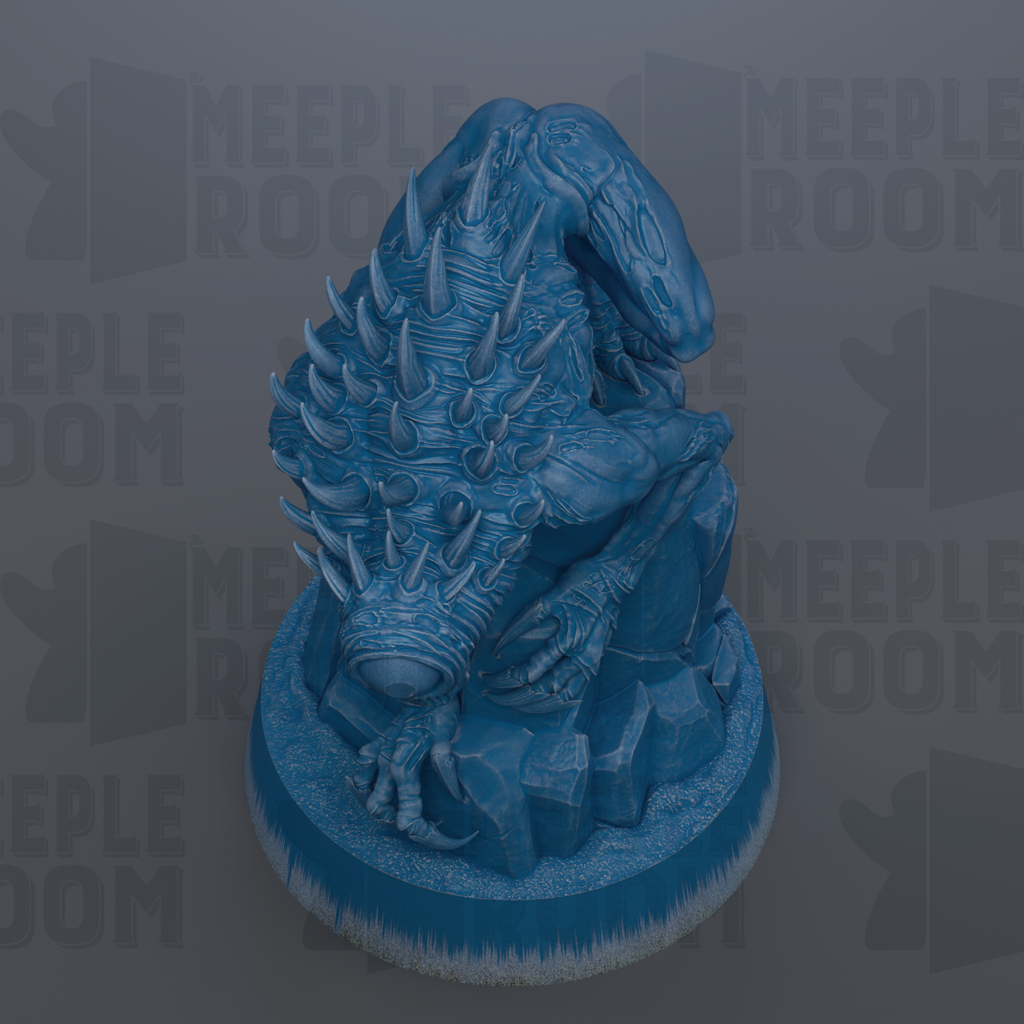 A blue, spiky, and textured statue of a creature, possibly a mythical or fantastical being, sitting on a rock formation.
