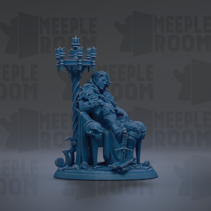 A blue figurine of a seated figure, possibly a king or ruler, with a large candle holder on their lap.