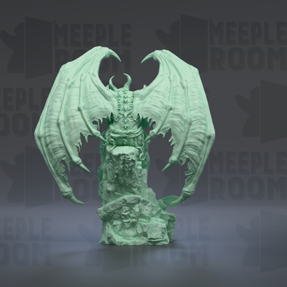 A green, winged dragon statue with intricate details and a fierce expression, standing on a rock formation against a dark background.