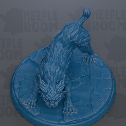 A blue, sculpted statue of a fierce-looking creature, possibly a mythical or fantastical animal, is displayed on a blue base.