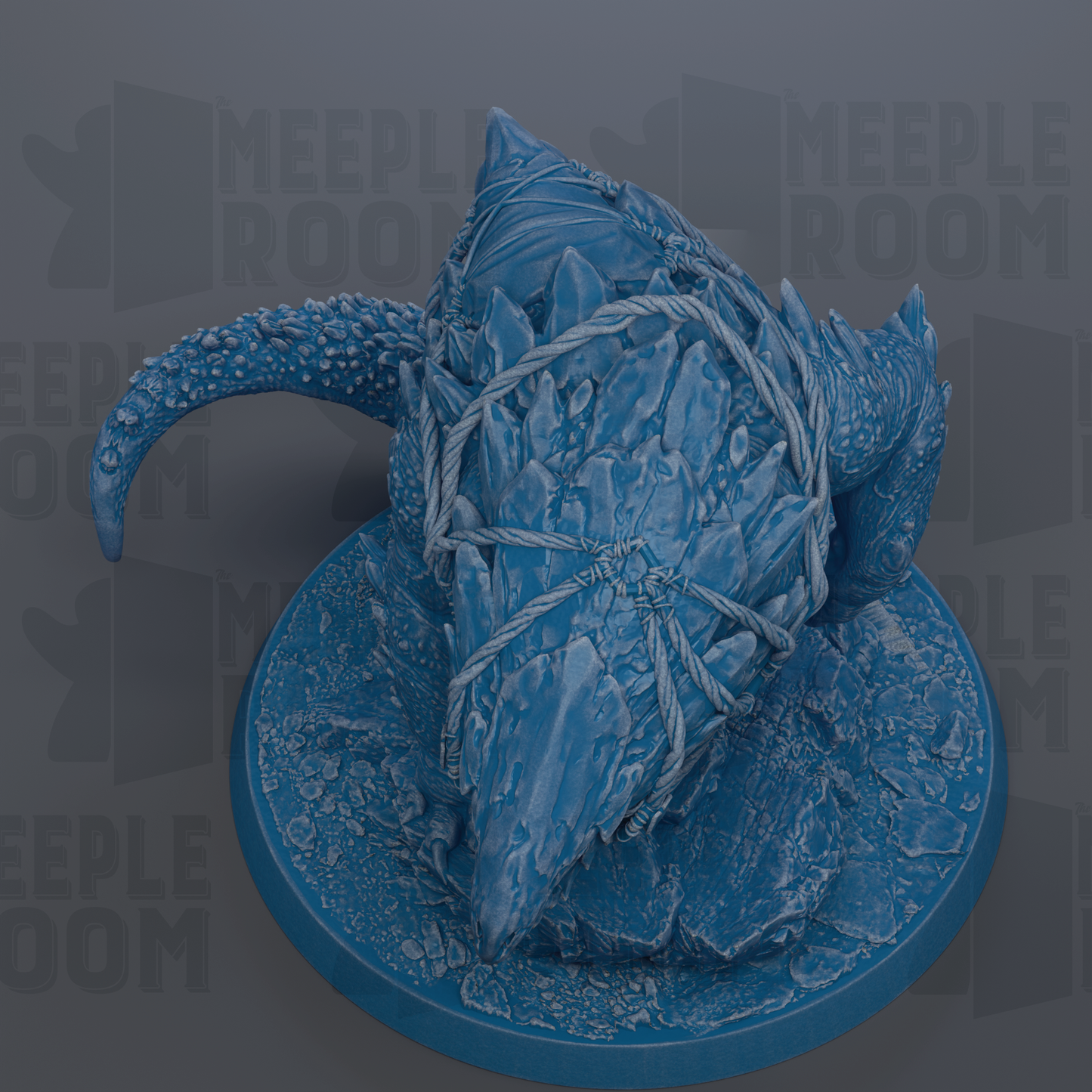A blue, icy-looking creature with sharp teeth and claws, sitting on a blue base.