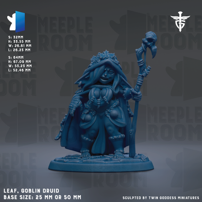 The image is a detailed model of a blue Goblin Druid figurine, with a base size of 25mm or 50mm. The figurine is holding a staff and has a distinctive hooded cloak. The background features the text "MEPLE ROOM" repeated multiple times, suggesting the figurine is part of a larger collection or series. The image does not contain any text that can be described in more detail, and it does not include any additional information about the figurine's origin or creator.
