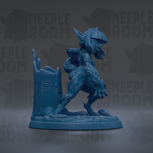 A blue figurine of a fantastical creature, possibly a dragon or wolf, standing on a base and holding a weapon.