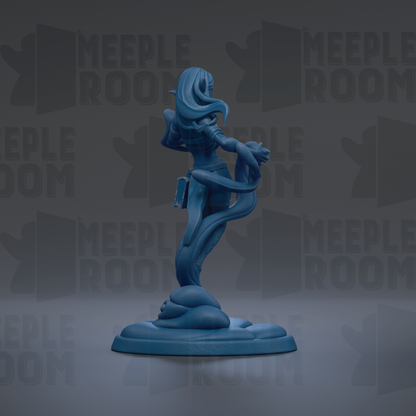 A blue figurine of a woman with long hair and a flowing skirt, standing on a base and holding a snake.