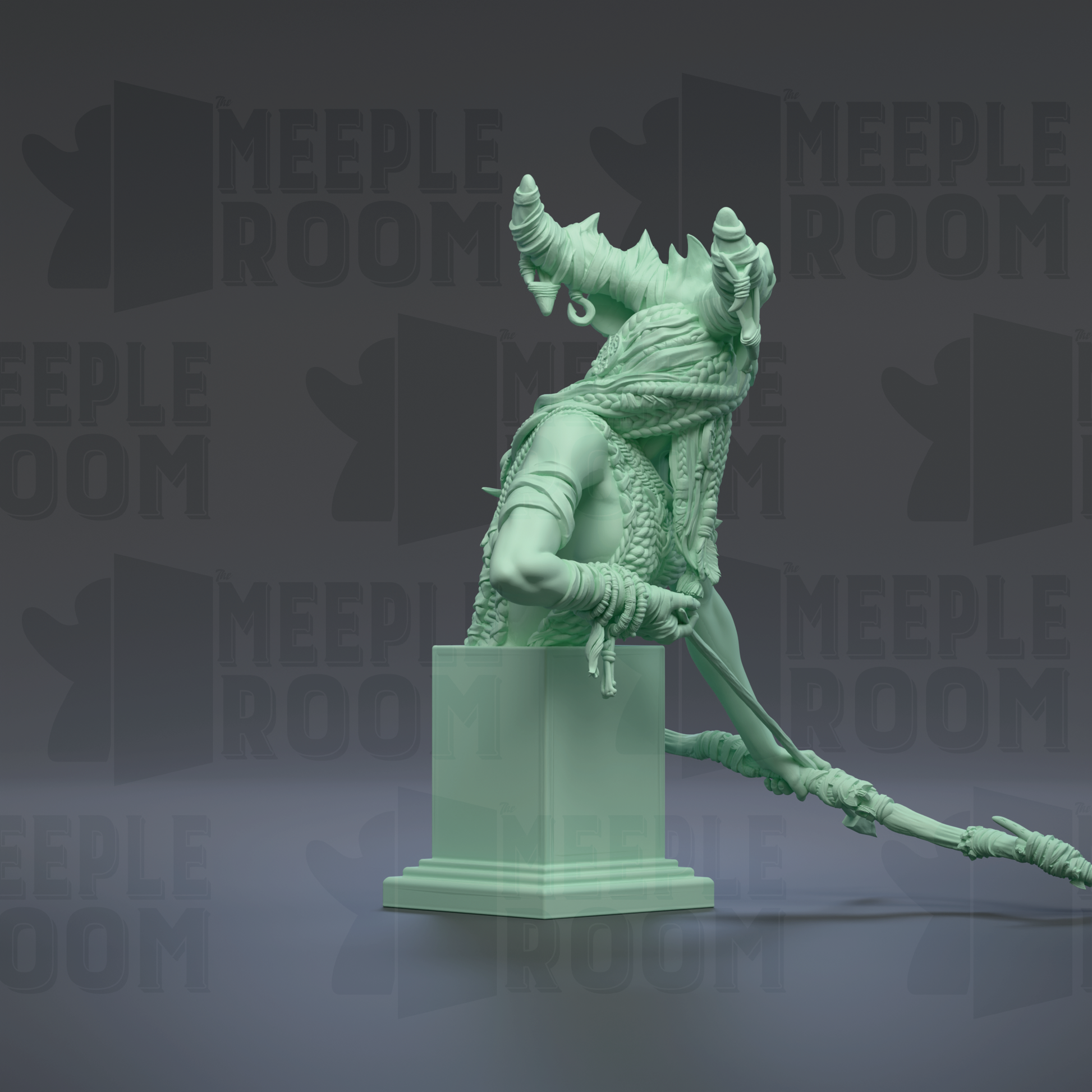 A green statue of a person with a sword and shield, standing on a pedestal.