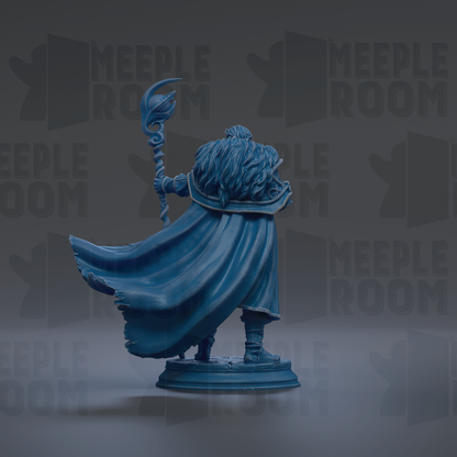 A blue figurine of a person holding a staff and wearing a flowing cape, standing against a dark background with repeated text.