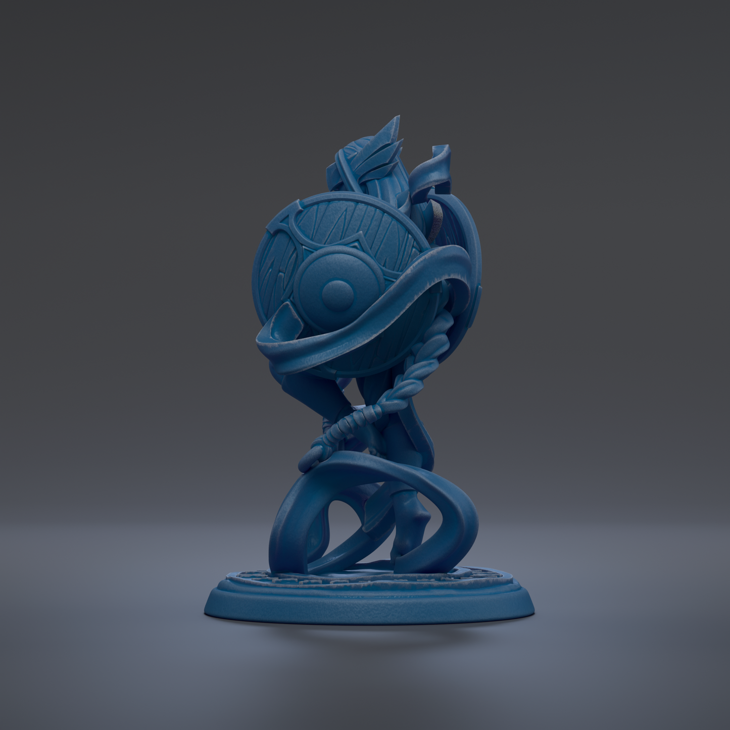 A blue, abstract sculpture with a circular base and a twisted, coiled design.