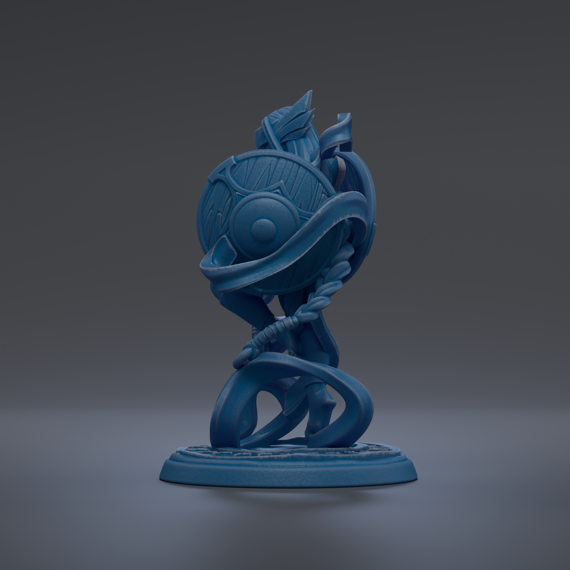 A blue, abstract sculpture with a circular base and a twisted, coiled design.