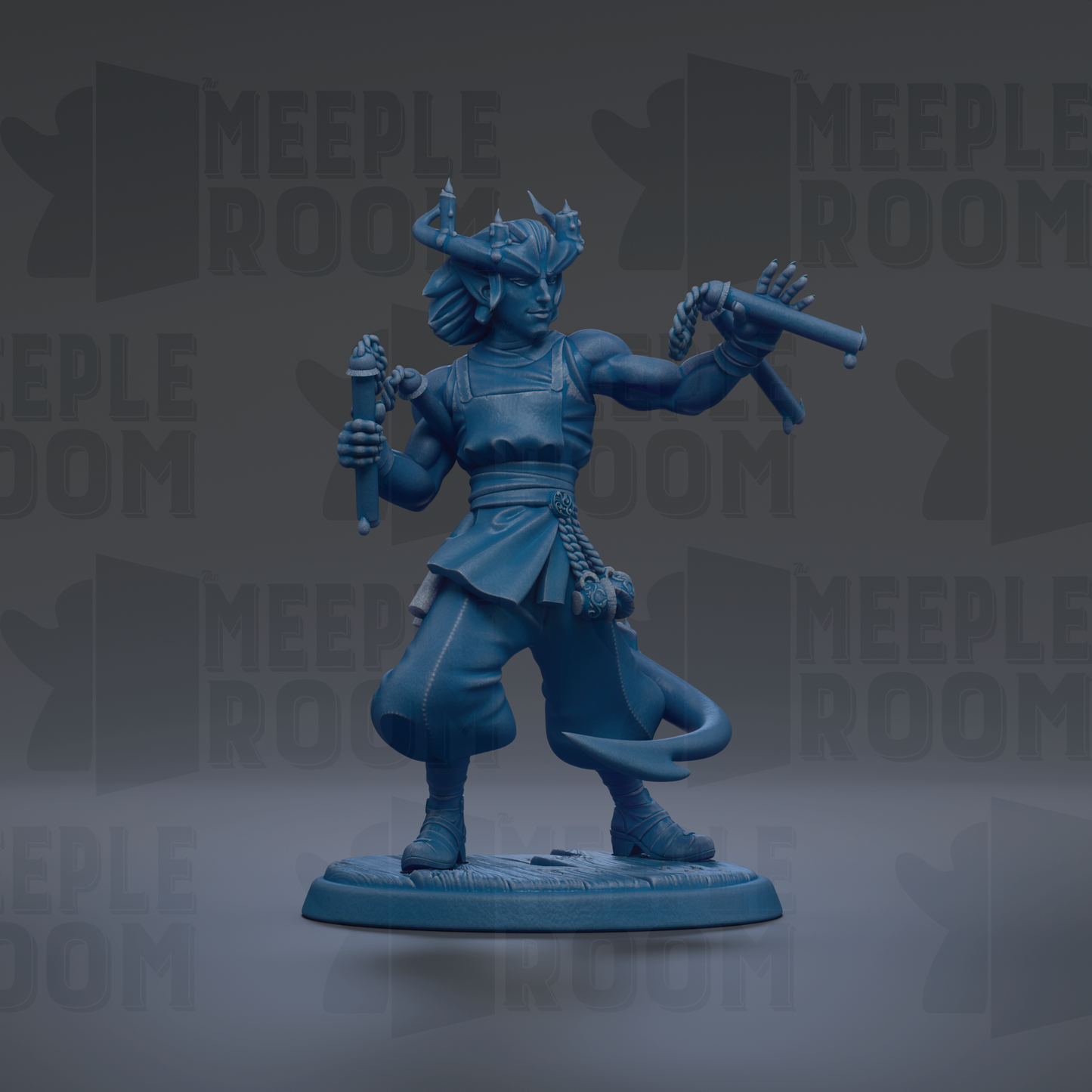 A blue figurine of a warrior-like character with horns and a sword, standing on a base and holding a shield.