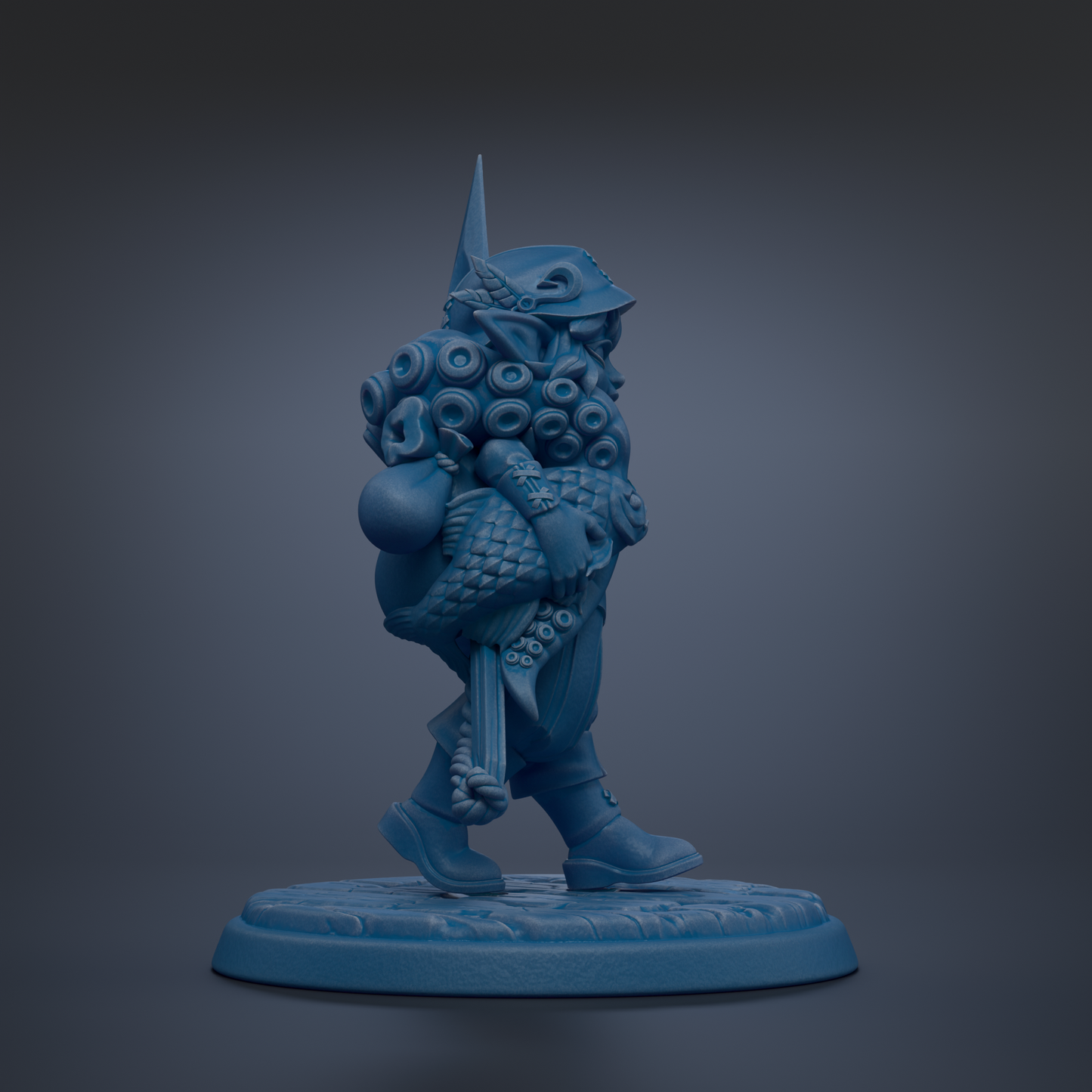 A blue figurine of a fantastical creature with an intricate, detailed design and a pointed hat, standing on a blue base.