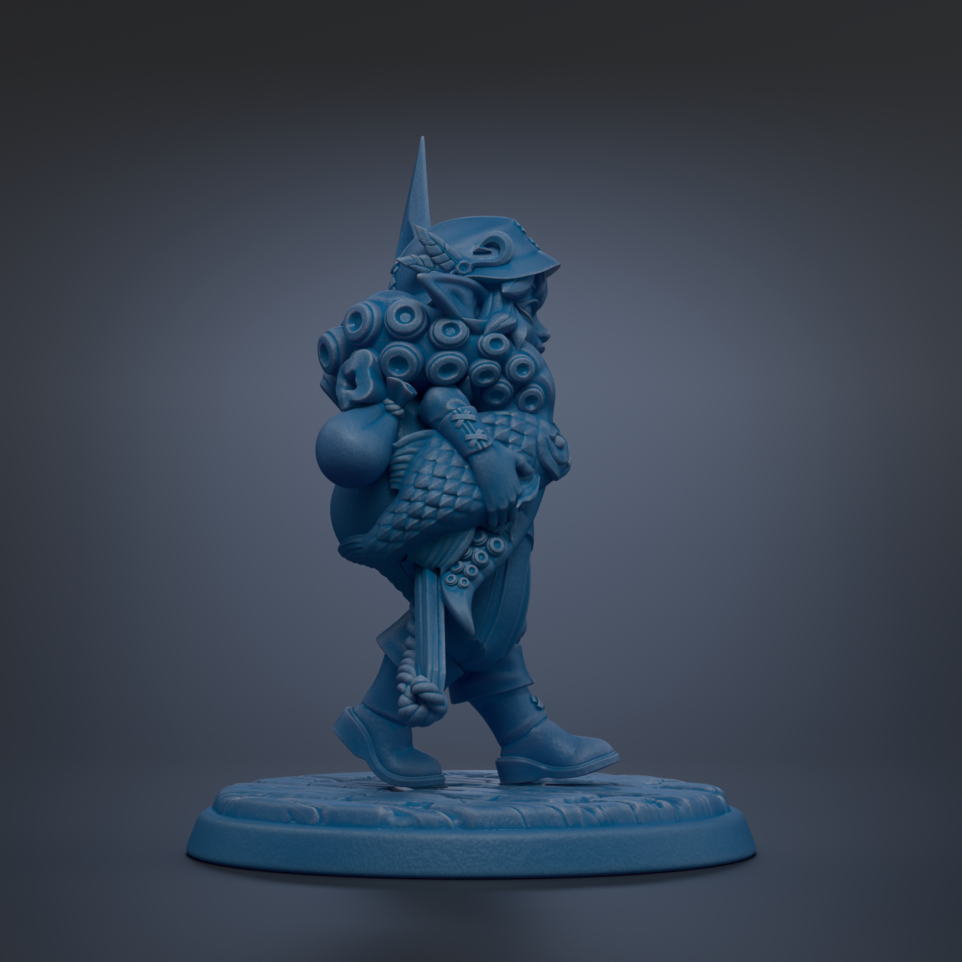 A blue figurine of a fantastical creature with an intricate, detailed design and a pointed hat, standing on a blue base.