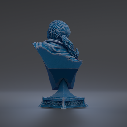 A blue bust sculpture of a person with long hair, sitting on a pedestal with intricate designs.