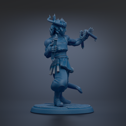 A blue figurine of a warrior standing on a base, holding a weapon and wearing a crown.