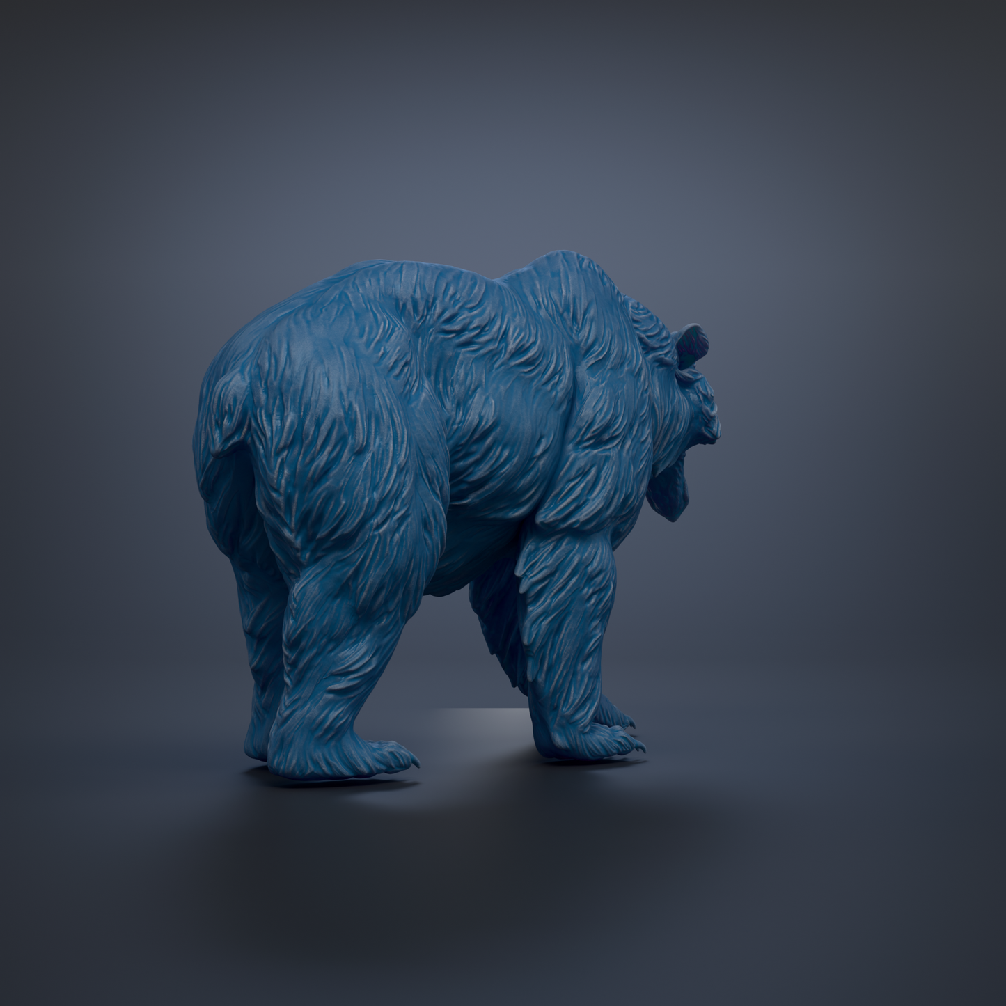 A blue bear statue is shown against a dark background.