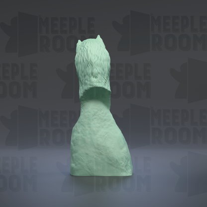 A green, textured statue of a cat's head is displayed against a dark background with repeated text.