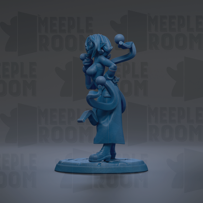 A blue figurine of a woman with a large head and long hair, standing on a base and holding a small object in her hand.
