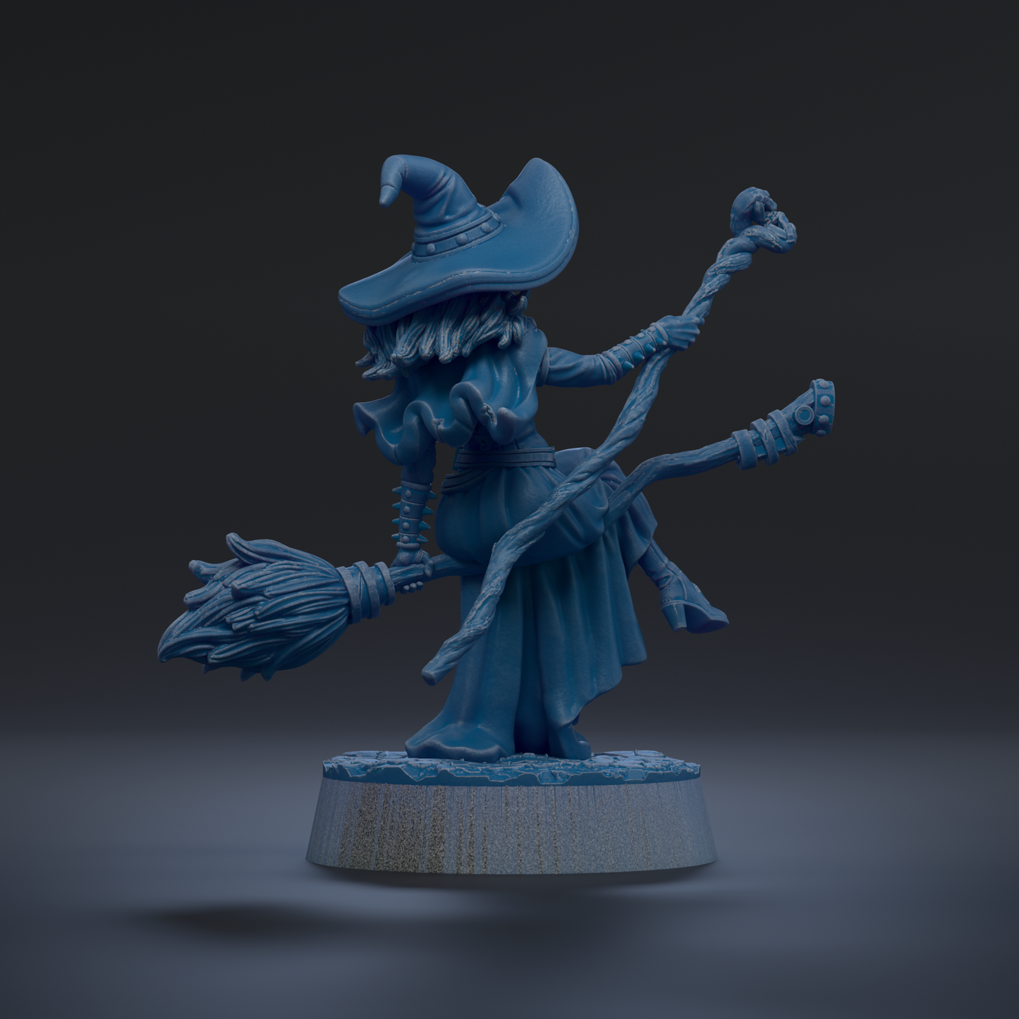 A blue, 3D-rendered fantasy character with a pointed hat, broom, and staff, standing on a base.