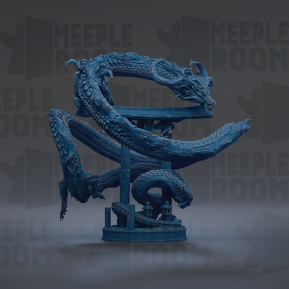 A large, intricately designed blue dragon sculpture is prominently featured in the center of the image, surrounded by a dark background.