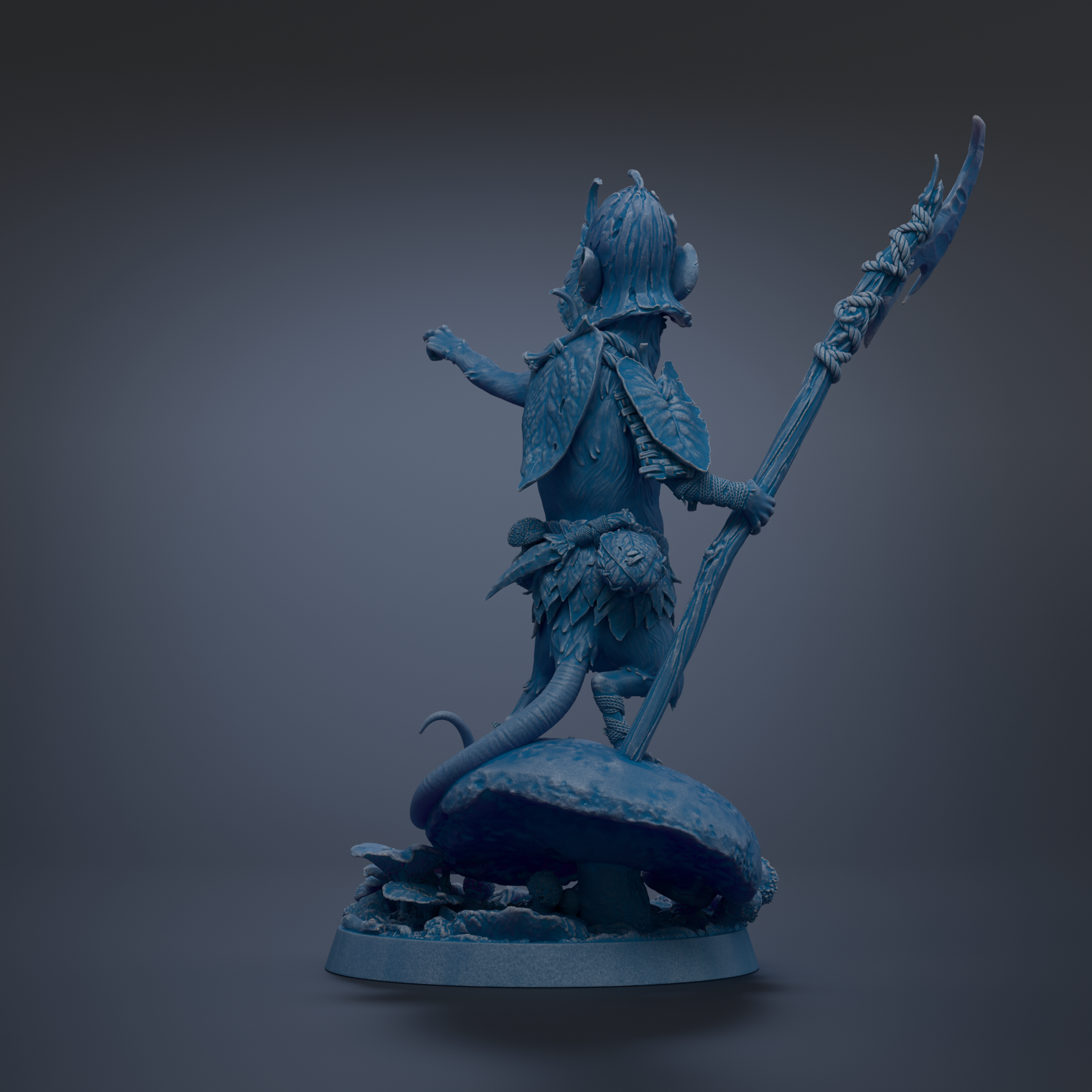 A blue figurine of a fantastical creature, possibly a dragon or serpent, standing on a mushroom-shaped base and holding a staff or weapon.