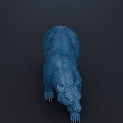 A blue bear statue is shown against a dark background.