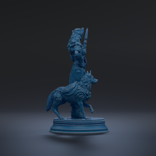 A blue statue of a warrior standing on a pedestal, holding a sword and accompanied by a wolf-like creature.