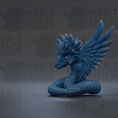 A blue dragon-like creature with large, detailed wings and a coiled body is the main focus of the image.