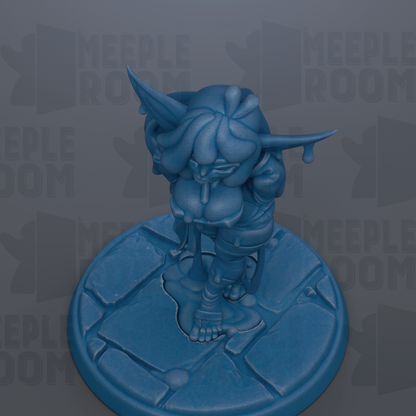 A blue figurine of a character with a large head and long horns, standing on a blue base.