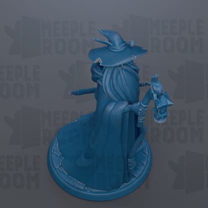 A blue figurine of a wizard or magical figure, wearing a pointed hat and holding a staff, is shown against a dark background with repeated text.