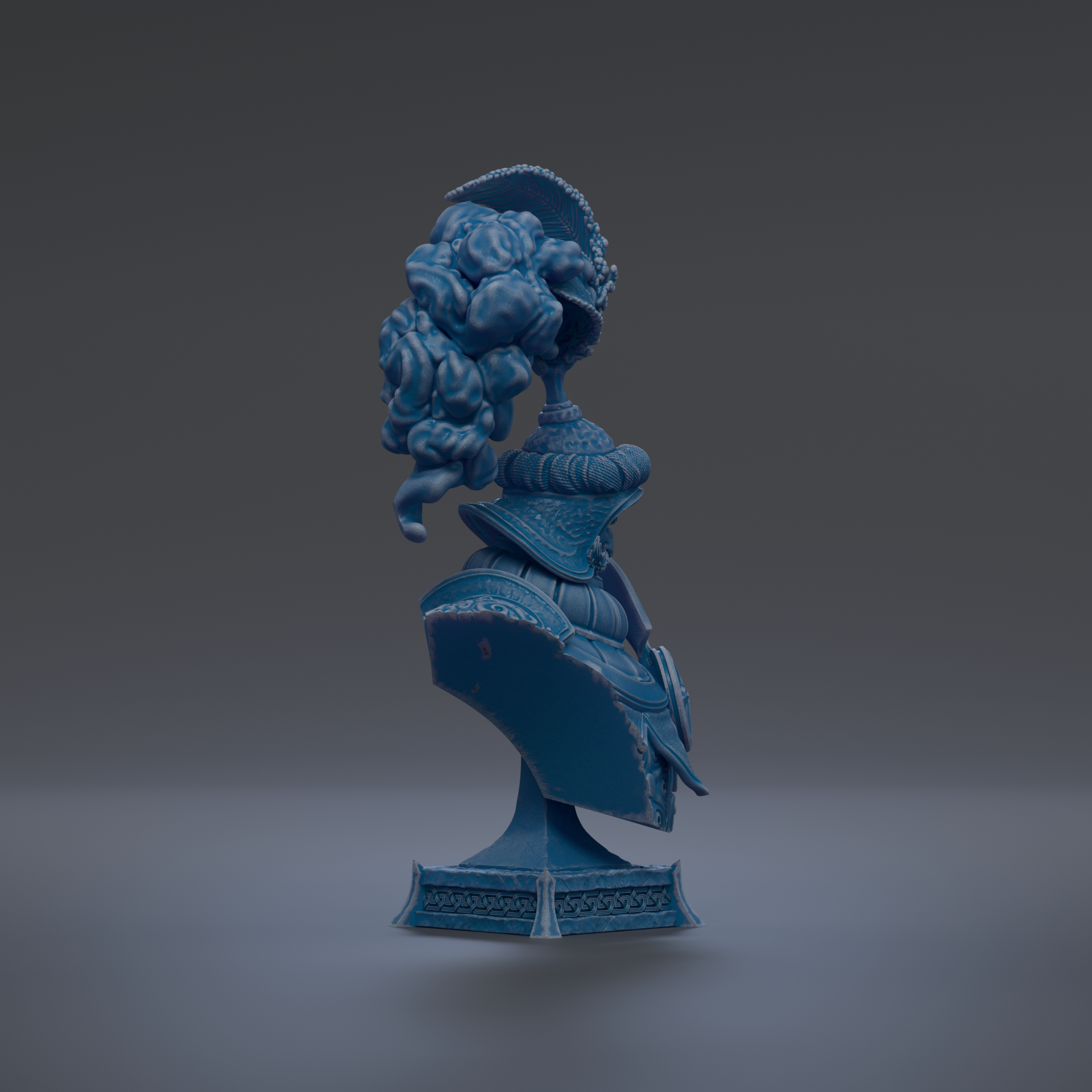 A blue, sculpted statue of a person with a large, intricate headdress and ornate clothing.