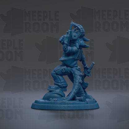 A blue figurine of a character with a large head and a long tail, holding a weapon and standing on a platform.
