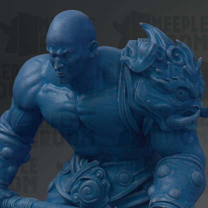 A close-up view of a blue, sculpted figure with a fierce expression, holding a weapon.