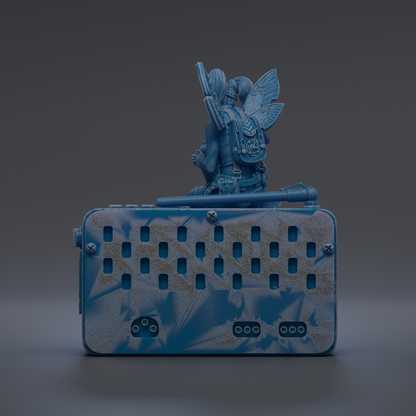 A blue, metallic object resembling a radio or speaker with a winged figure perched on top.