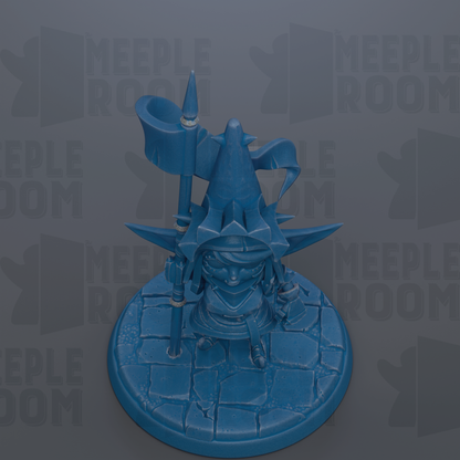 A blue, 3D-rendered fantasy character with a pointed hat and a flag, sitting on a stone base.