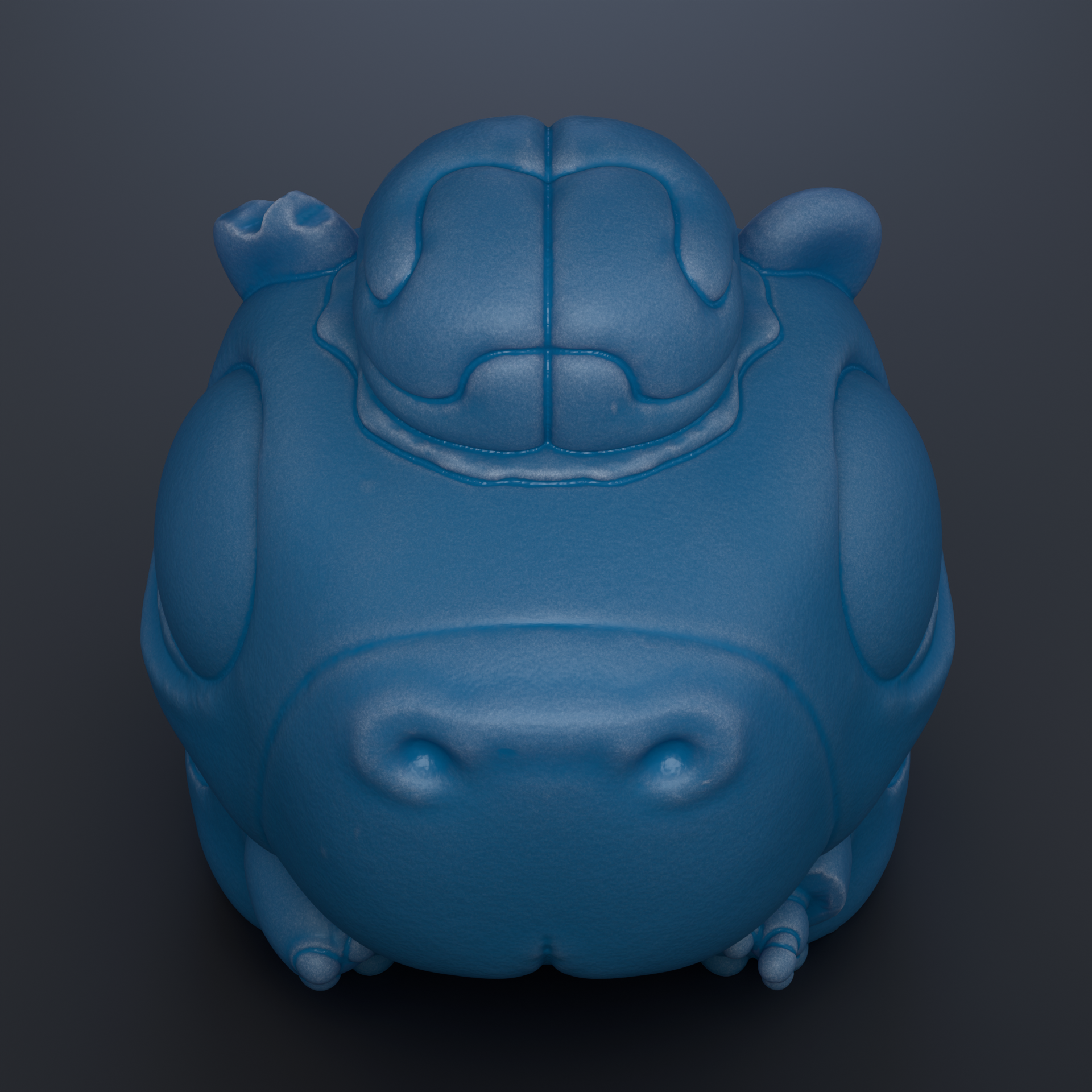 A blue, cartoonish-looking object resembling a frog or a small animal, with a large head and two small ears.