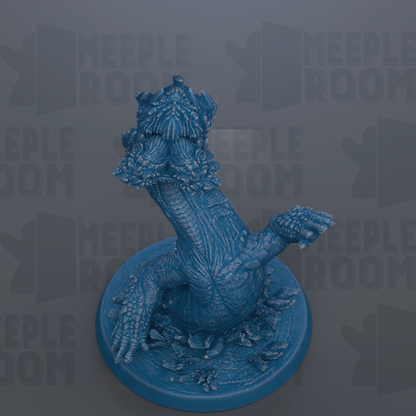 A blue, textured figurine of a creature with a large head and long neck, sitting on a blue base.