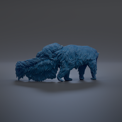 A blue, furry, and textured animal sculpture is shown in the image.