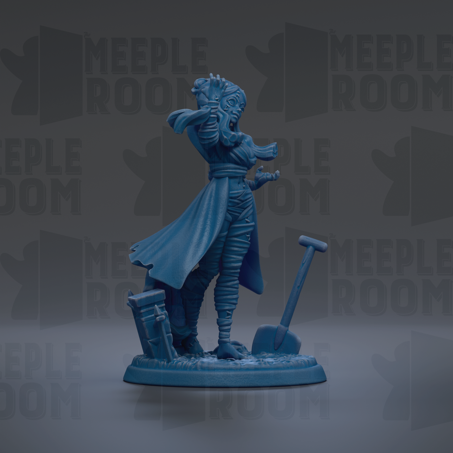 A blue figurine of a woman with a flowing cape and a shovel, standing on a base.