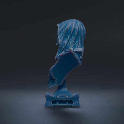 A blue, abstract sculpture with a flowing, draped appearance stands alone against a dark background.