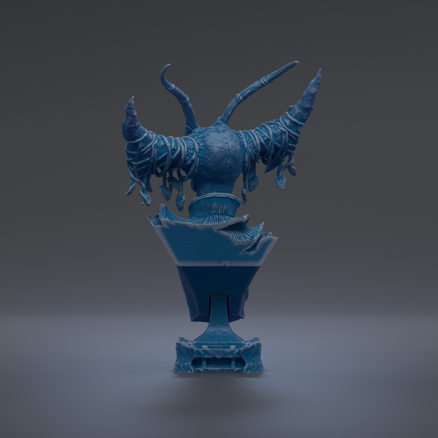 A blue, abstract sculpture with curved, organic shapes and a textured surface, standing on a pedestal.