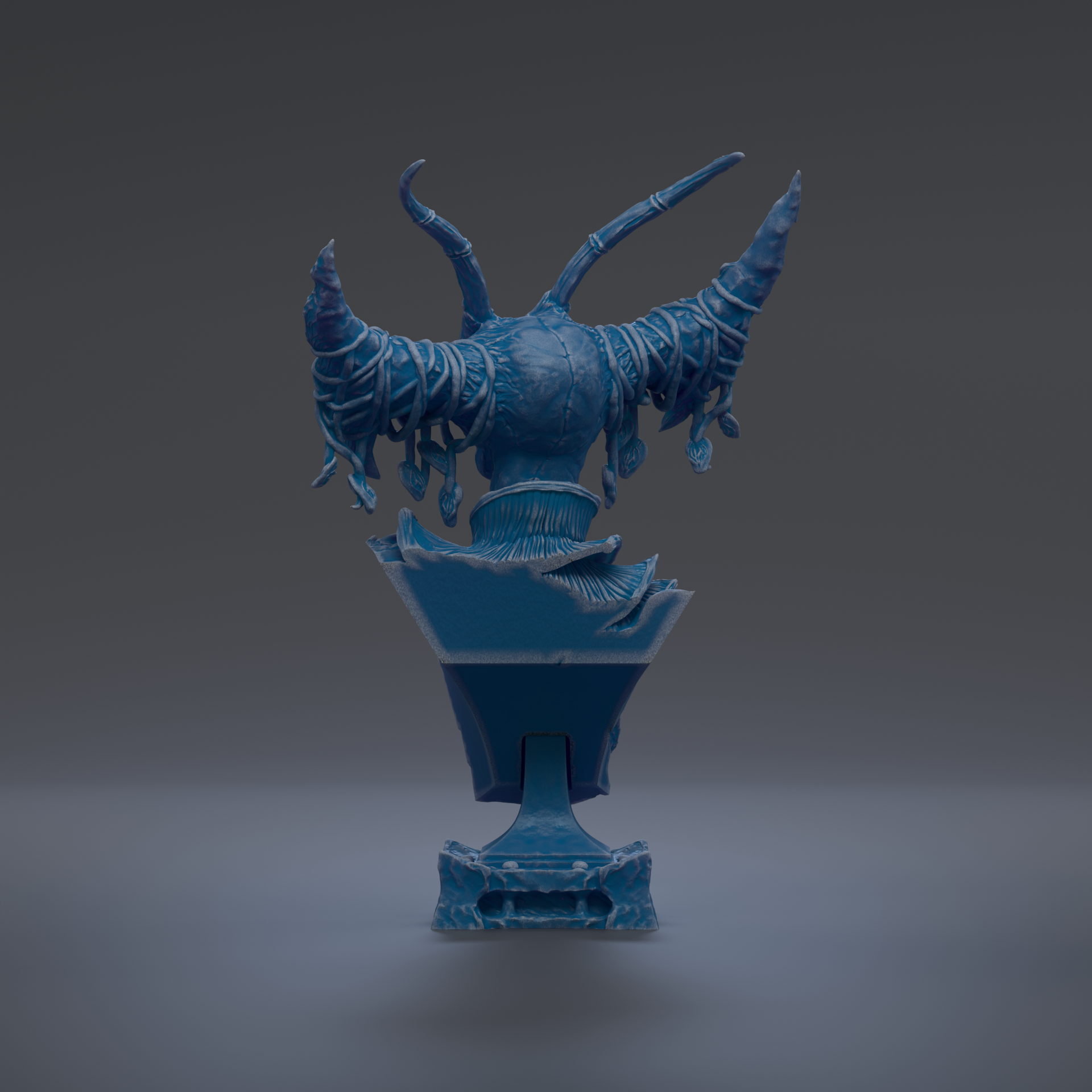 A blue, abstract sculpture with curved, organic shapes and a textured surface, standing on a pedestal.