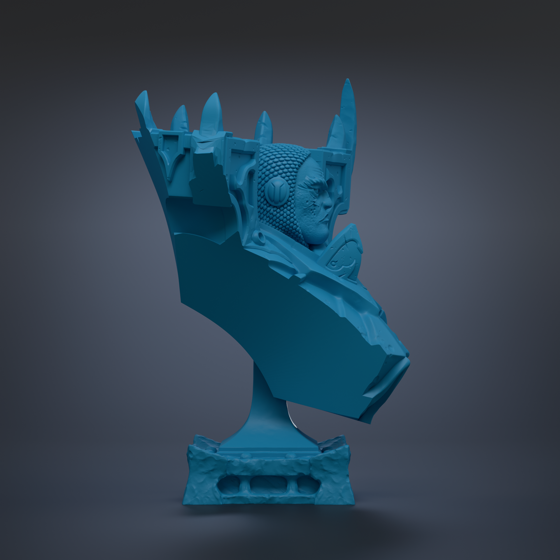 A blue, abstract sculpture with a face-like design on a dark background.