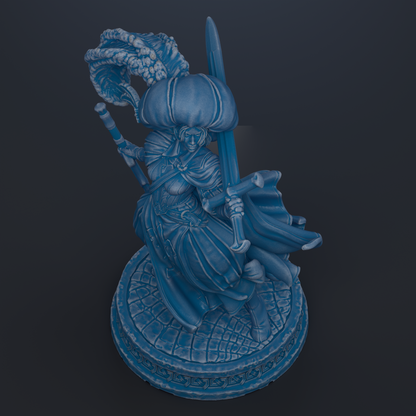 A blue statue of a woman holding a sword and a hat, standing on a circular base.