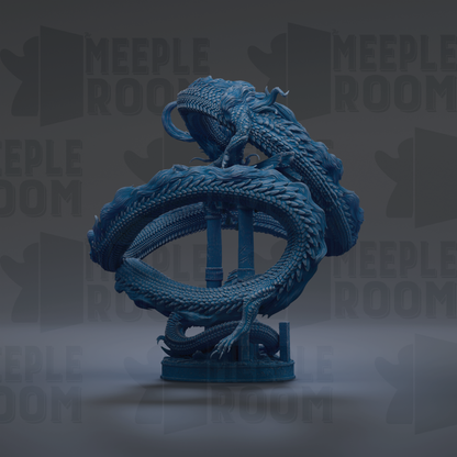 A blue dragon statue with intricate scales and flowing fins, standing on a pedestal against a dark background.