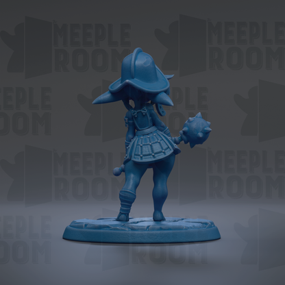 A blue figurine of a character with a pointed hat and a shield, standing on a base and holding a weapon.