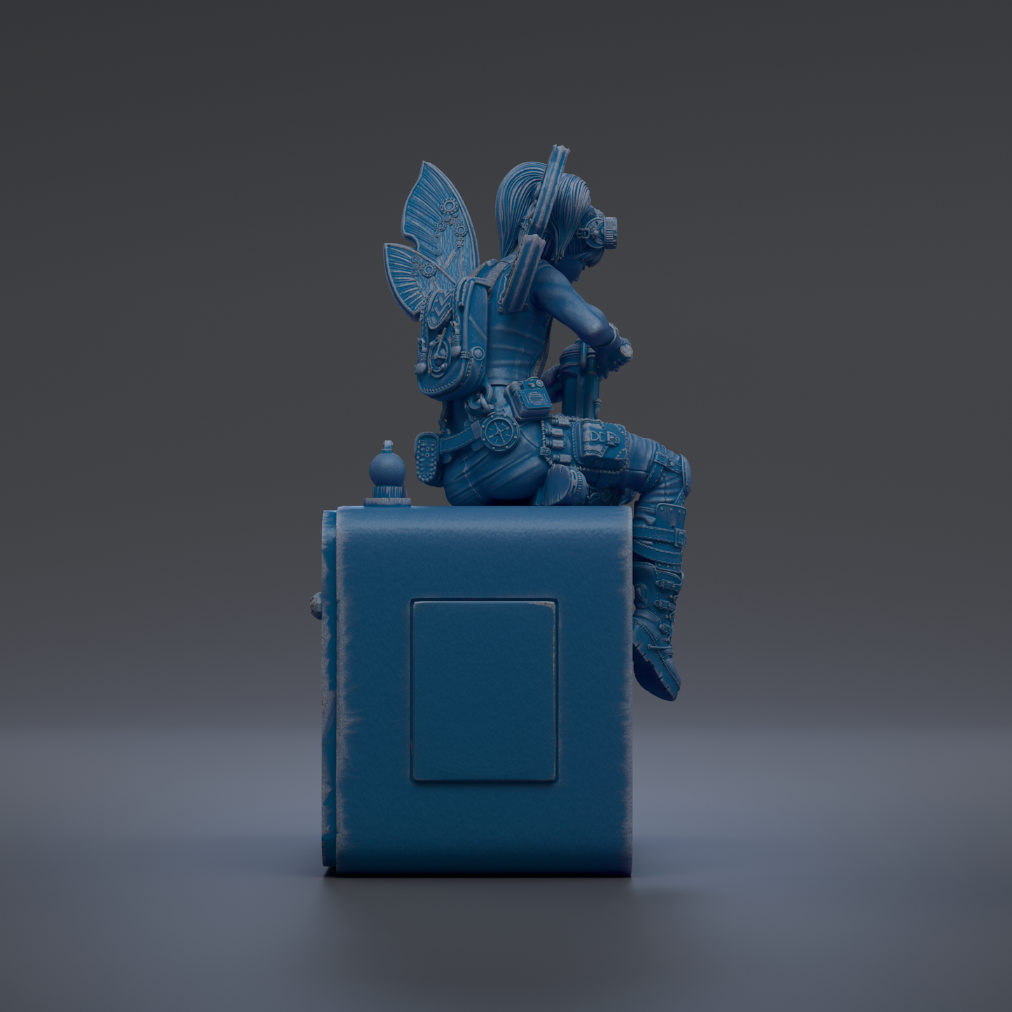 A blue, 3D-rendered figure of a person sitting on a blue rectangular object, which appears to be a small, square-shaped structure.