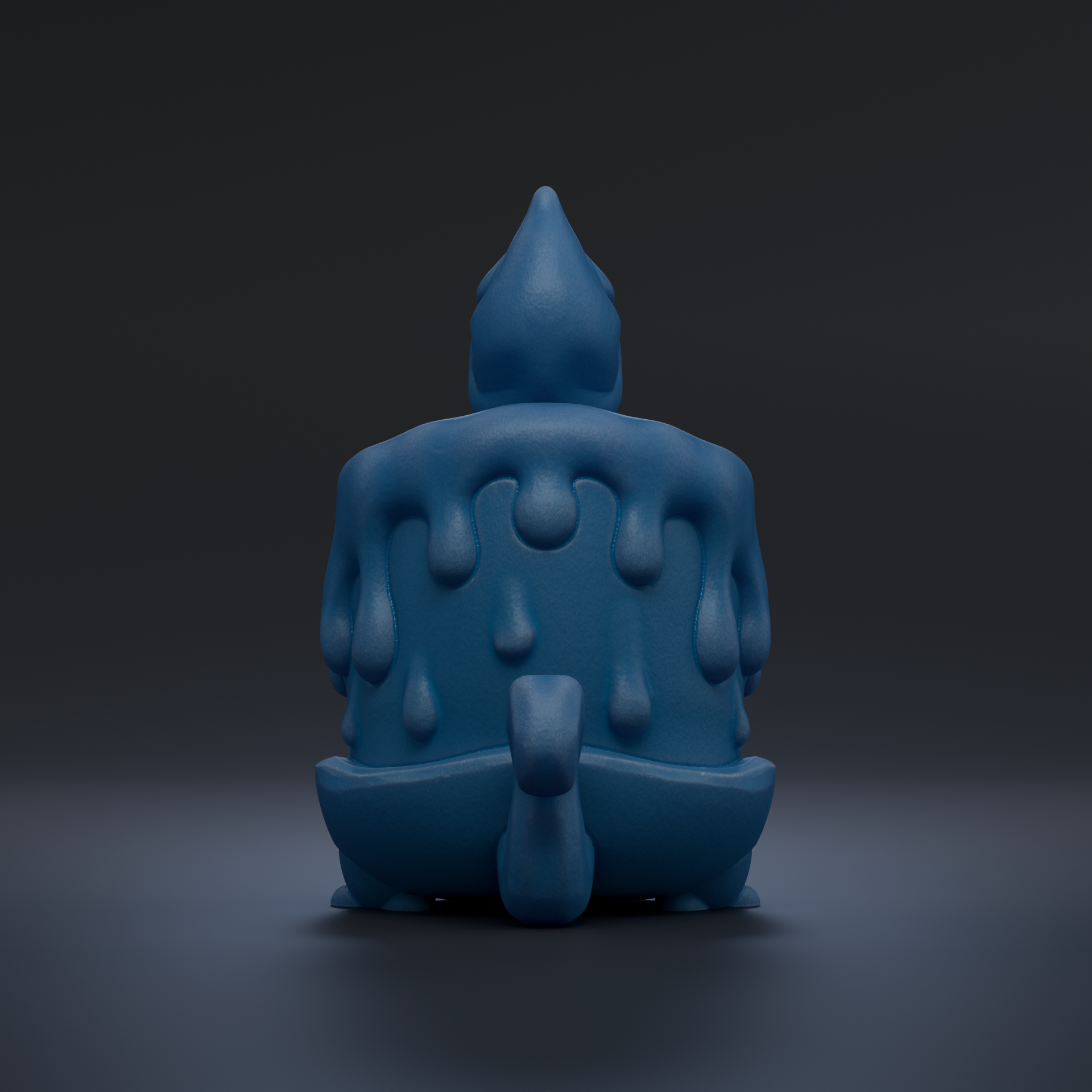 A blue, dripping candle-like object with a pointed top sits on a dark surface.