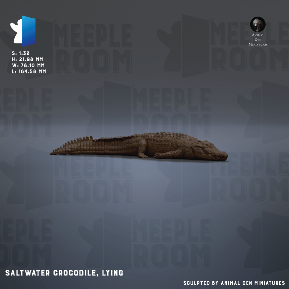 A saltwater crocodile lying on its side against a dark background.