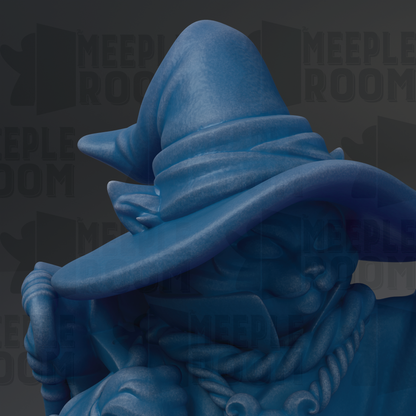 A blue statue of a cat wearing a wizard's hat.
